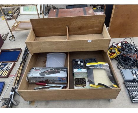 A TWO TIERED STORAGE CART AND AN ASSORTMENT OF TOOLS ETC 
