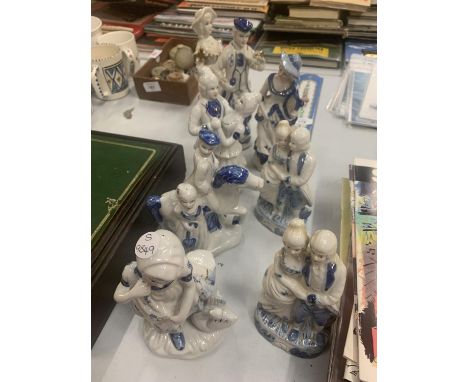 EIGHT CERAMIC FIGURE GROUPS IN THE STAFFORDSHIRE STYLE 