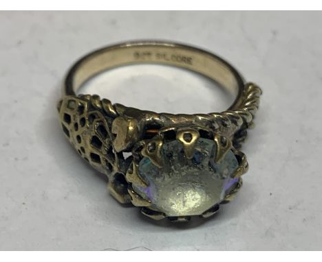 A VINTAGE GOLD AND SILVER RING WITH LARGE  CENTRE STONE IN A PRESENTATION BOX 