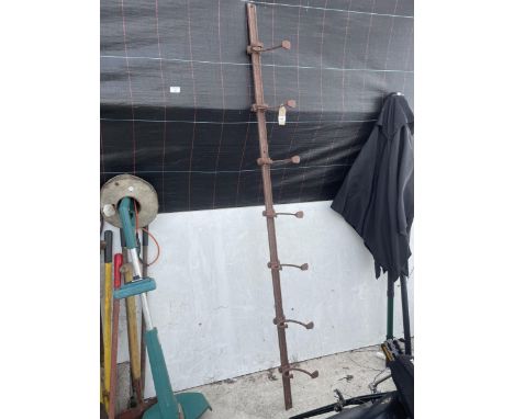 A VINTAGE WROUGHT IRON COAT HOOK 