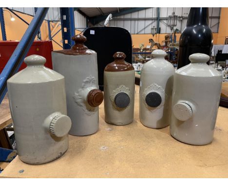FIVE VINTAGE STONEWARE HOT WATER BOTTLES 