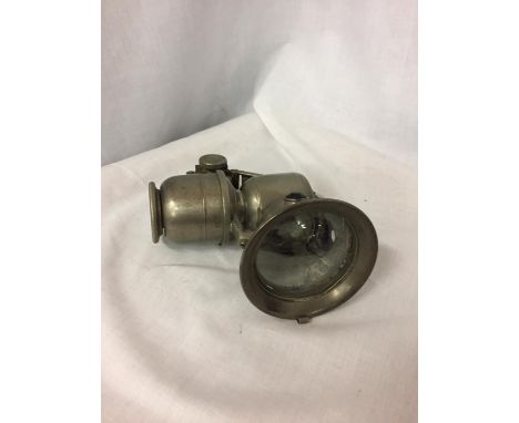 A VINTAGE CAR LAMP BY JOSEPH LUCAS. GLASS A/F  CRACKED 