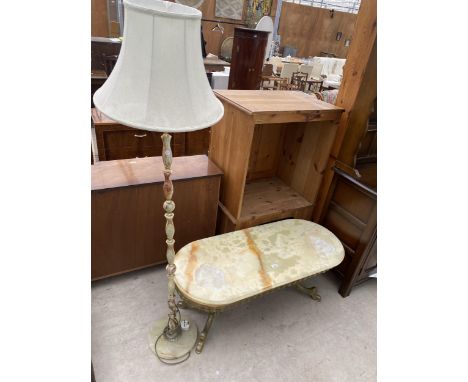 AN ONYX COFFEE TABLE ON A METALWARE BASE AND A STANDARD LAMP WITH SHADE 