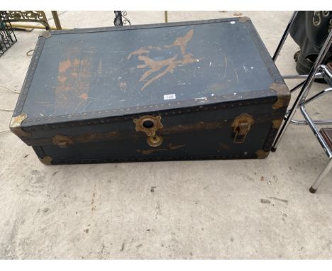 A VINTAGE TRAVEL TRUNK 