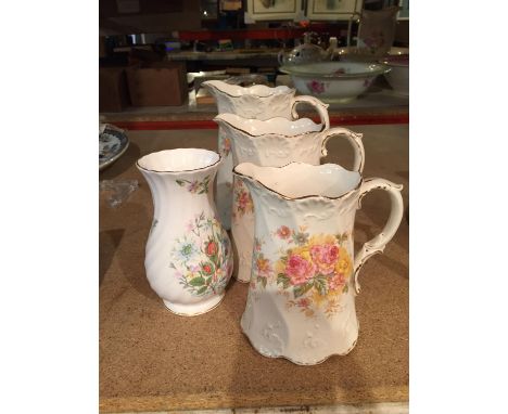 A TRIO OF GRADUATED JUGS MARKED JERSEY K &amp; CO LATE MAYERS TO THE BASE 