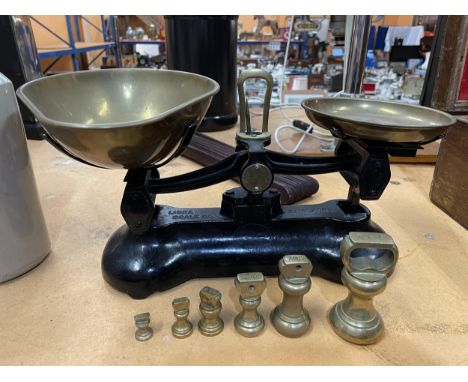 A VINTAGE SET OF LIBRA SCALES WITH WEIGHTS 