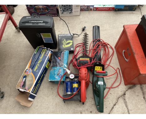 AN ASSOERTMENT OF TOOLS TO INCLUDE AN ELECTRIC HEDGE TRIMMER, A NAIL AND STAPLE GUN AND A FOOT PUMP ETC 