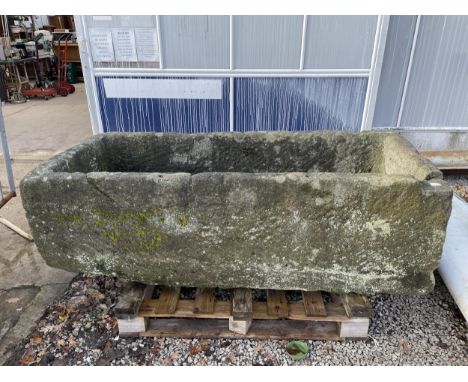 A LARGE STONE TROUGH 6' IN LENGTH AF 