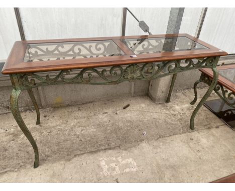 A MODERN HARDWOOD CONSOLE TABLE ON A METALWARE EFFECT BASE WITH INSET GLASS TOP 52 INCHES X 18 INCHES 