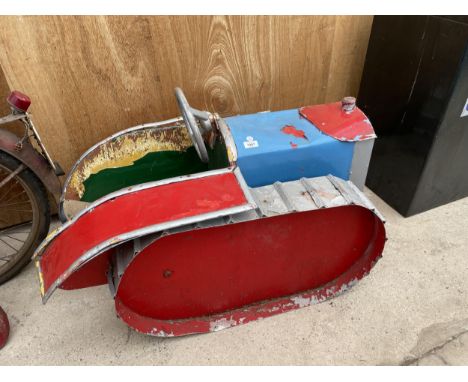 A VINTAGE CHILDRENS TRACTOR FAIRGROUND RIDE 