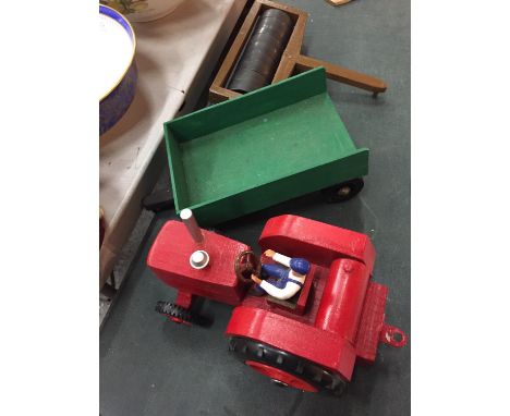 A WOODEN MODEL OF A FARM TRACTOR TOGETHER WITH ATTACHABLE TRAILER AND FIELD ROLLER 