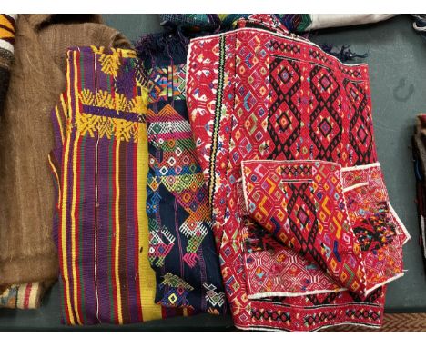 VARIOUS BRIGHTLY COLOURED TEXTILES 