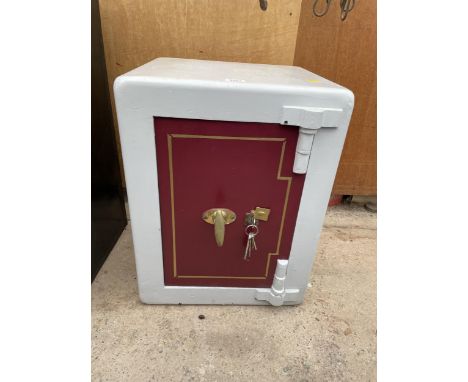 A REFURBISHED VINTAGE SAFE WITH BRASS HANDLE AND KEY 