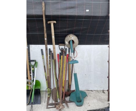 AN ASSORTMENT OF GARDEN TOOLS TO INCLUDE SHOVELS, GARDEN SHEARS AND A BLACK AND DECKER STRIMMER ETC 