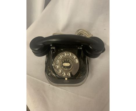 A VINTAGE BLACK TELEPHONE WIRED FOR MODERN USE 