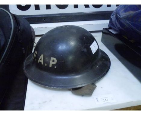 A World War II First Aid Post tin helmet