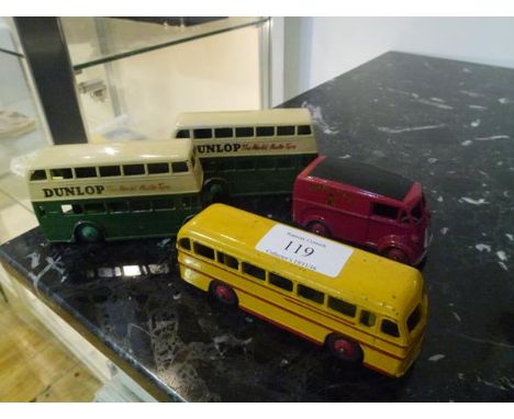 A group of Dinky model vehicles comprising: a Leyland Royal Tiger Coach no. 282; a Royal Mail van no. 260; and two double dec