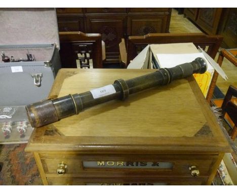 A World War I army issue artillery sighting scope, engraved "W.Watson & Sons Ltd, London 1916....no. 4 Mark II", with leather