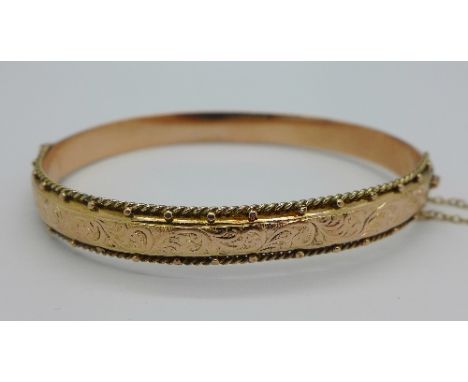 A Victorian 9ct gold bangle, Birmingham 1900, weight 8.9g, a/f