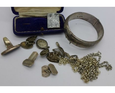Silver jewellery including a bangle, two pairs of cufflinks, ring, locket, chains, etc., weight 79g