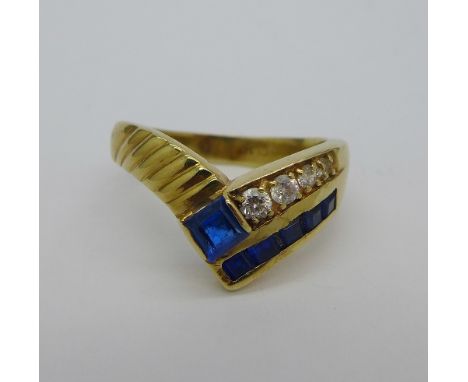 A 14ct gold, blue and white stone ring, weight 4.7g, size R