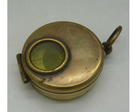A brass cased compass, A.R. Baines, Harrogate