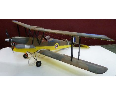 A large model bi-plane with engine, lacking controller, wingspan 130cm