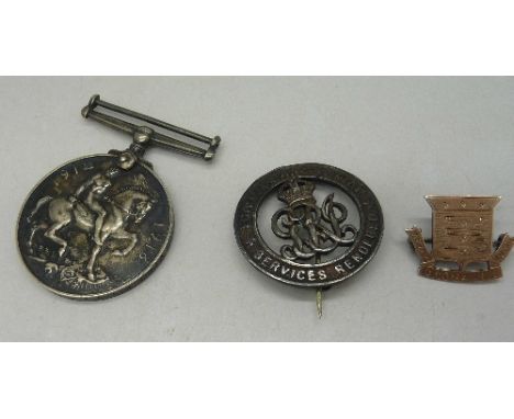 A silver wound badge, number 465270, a gilt Army Ordnance Corps badge and a 1914-18 medal to 22785 Pte. J.J. Hope S.Wales Bor