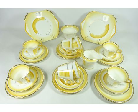 Art Deco Shelley tea service comprising eight cups, eleven saucers, twelve tea plates, two cake plates, sugar bowl and milk j