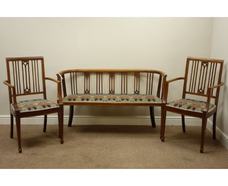 Edwardian inlaid mahogany tub shaped boudoir settee (W124cm), and two matching armchairs (W54cm), upholstered in 'Lanthe by R