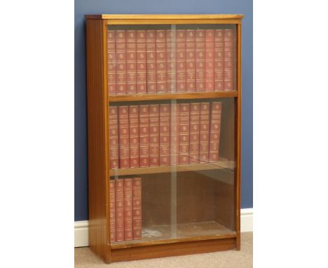 Mid 20th century set 1-24 Encyclopedia Britannica in teak bookcase with sliding glass doors, labelled 'Manufactured Exclusive