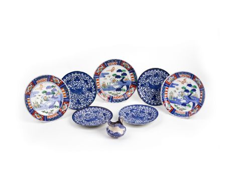 SEVEN ASSRTED PORCELAIN PLATES AND A COPELAND SPODE MILK JUG
Comprising: four blue and white plates with flying Phoenix decor