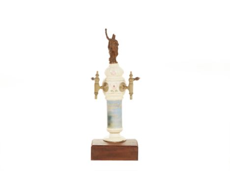 A VINTAGE CERAMIC AND BRASS DOUBLE BEER TAP
The main body decorated with wild boar, the column with a king finial
83cm high
C
