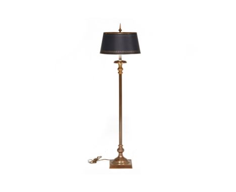 A BRASS STANDARD LAMP
Of traditional style on square base, the painted toleware shade with laurel border
124cm high
Condition