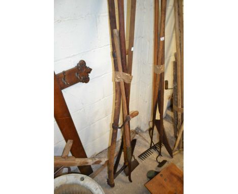 Bundle of various tools to include a scythe, various hoes etc