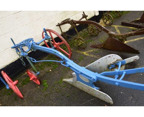 R. Hornsby &amp; Sons, GDRH Grantham, England, single furrow iron framed horse drawn plough, painted in red, silver and blue