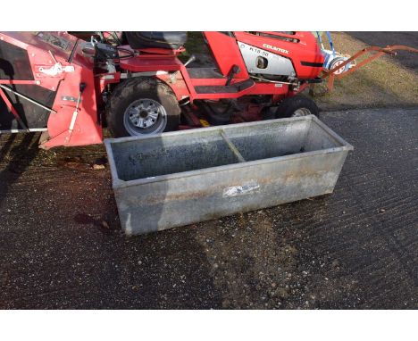 A galvanised livestock drinking trough