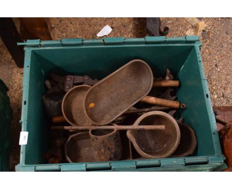 Large green box of various assorted tools, cast metal pots etc