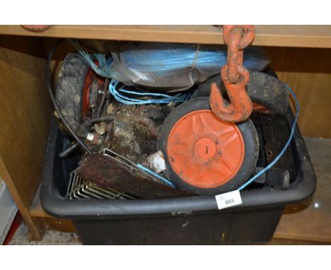 Box of various items to include small engine, various wheels etc