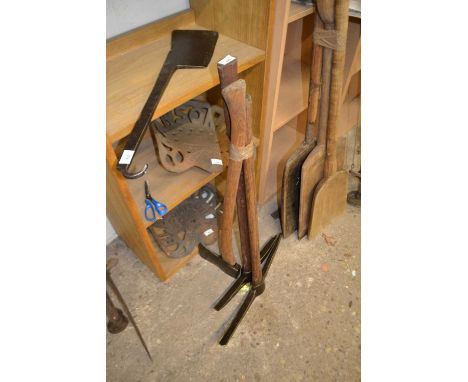 Two pickaxes and a felling axe