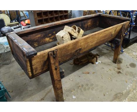 Large wooden floor standing trough
