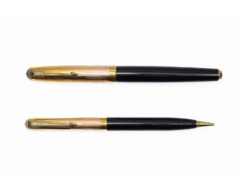 1946 Parker 51 Vacumatic Empire Cap Solid 14 K pink and yellow gold cap fountain pen set, boxed. The Empire 51 set with desig