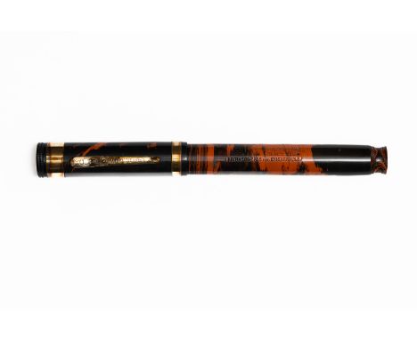 Security oversized red mottled hard rubber fountain pen. The Security pen was made famous for its check protector in the top 