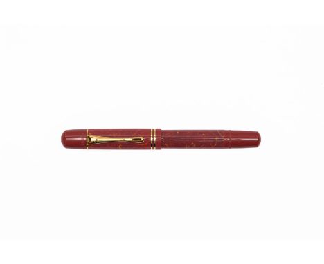 2017 Pelikan M101N Bright Red Marble special edition fountain pen with box, ink bottle, pen case, outer box and papers. A vin