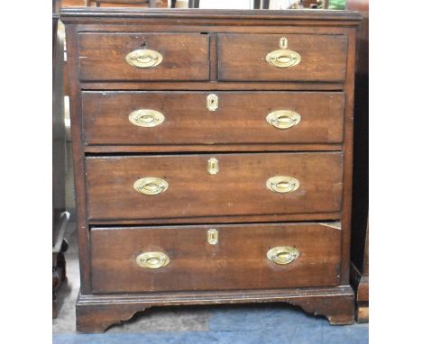 A 19th Century Oak Chest of Two Short and Three Long Drawers on Bracket Feet, Back Left Foot Requires Attention, Oval Brass D