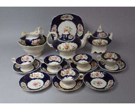 A 19th Century Gaudy Welsh Teaset to comprise Teapot, Lidded Sugar, Slop Bowl, Jug, Five Cups, Seven Saucers and a Cake Plate