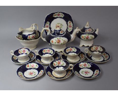 A 19th Century Gaudy Welsh Teaset to comprise Teapot, Lidded Sugar, Slop Bowl, Jug, Five Cups, Seven Saucers and a Cake Plate