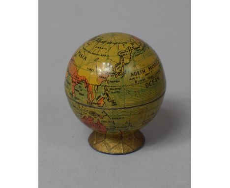 A Small Novelty Pencil Sharpener in the Form of a Globe, 5cm high 