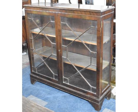 A Mahogany Astragal Glazed Display Cabinet on Bracket Feet, One Glass Panel Cracked, 108cm wide 