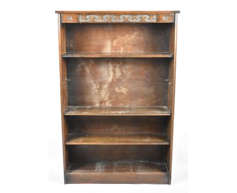 A Mid 20th Century Oak Three Shelf Open Bookcase with Blind Carved Top Rail, 76cm wide 